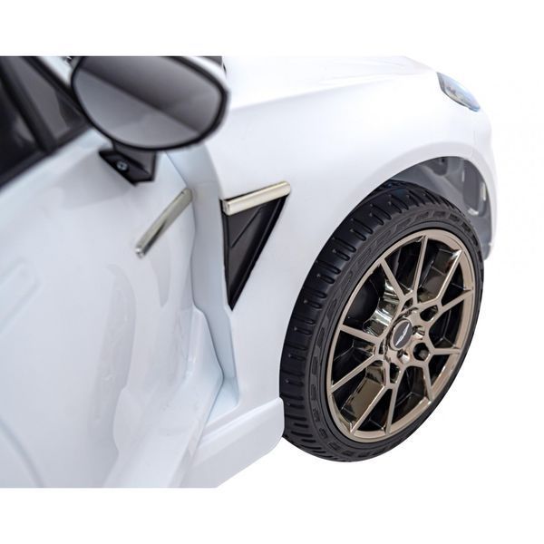 Aston Martin DBX для детей на батарейках Белый + Пульт дистанционного управления + EVA + Ремни безопасности + Медленный старт + Аудиосветодиод Белый PA.S310.BIA фото