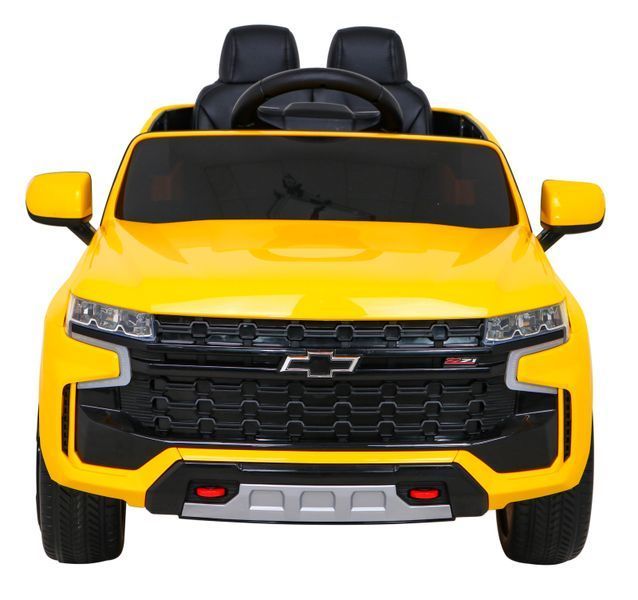 Лицензионный детский электромобиль Chevrolet Tahoe на пульте управления с музыкой и светом От 3 лет Желтый 1016 фото